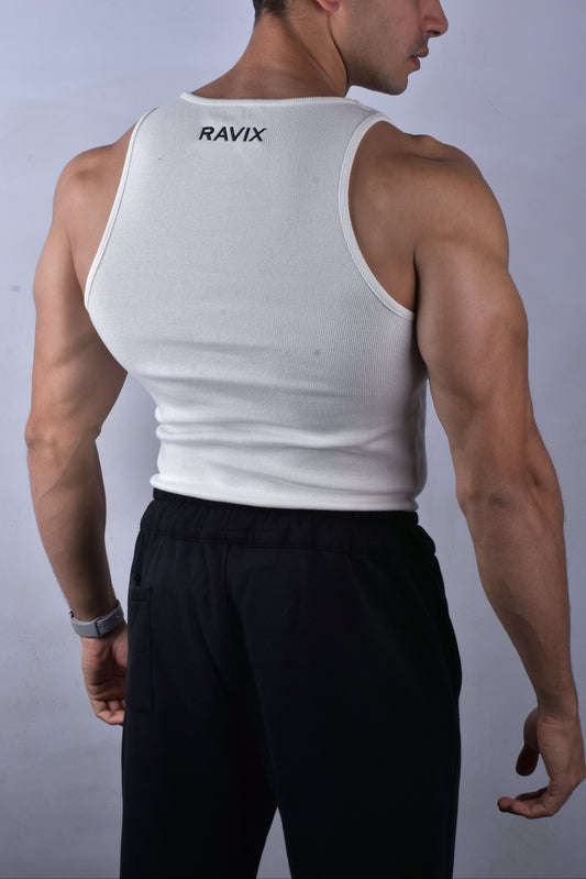 Man wearing a white tank top with 'RAVIX' branding on the back against a plain background