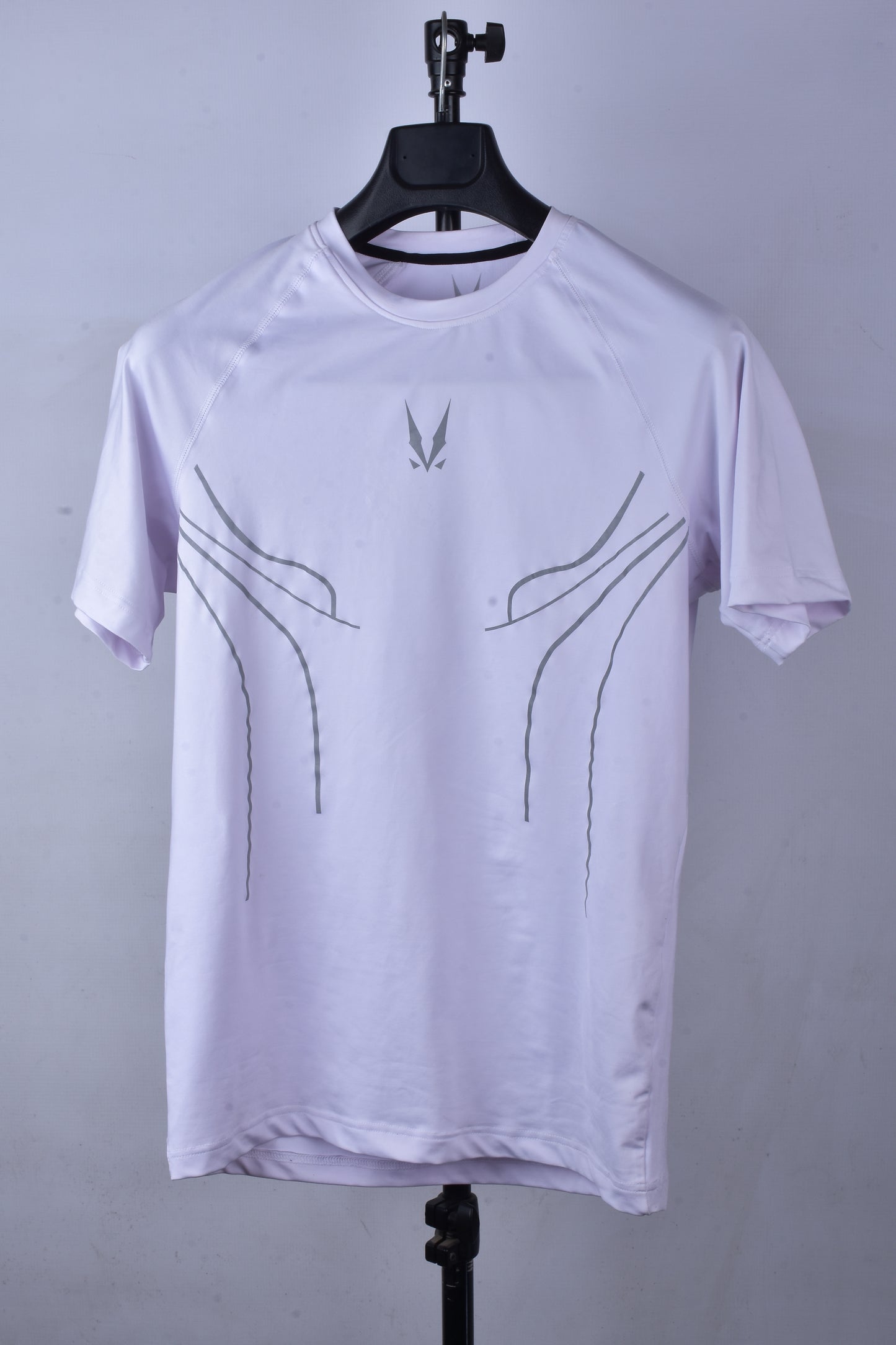 RAVIX white compression ray t-shirt with black abstract designs on a gray background