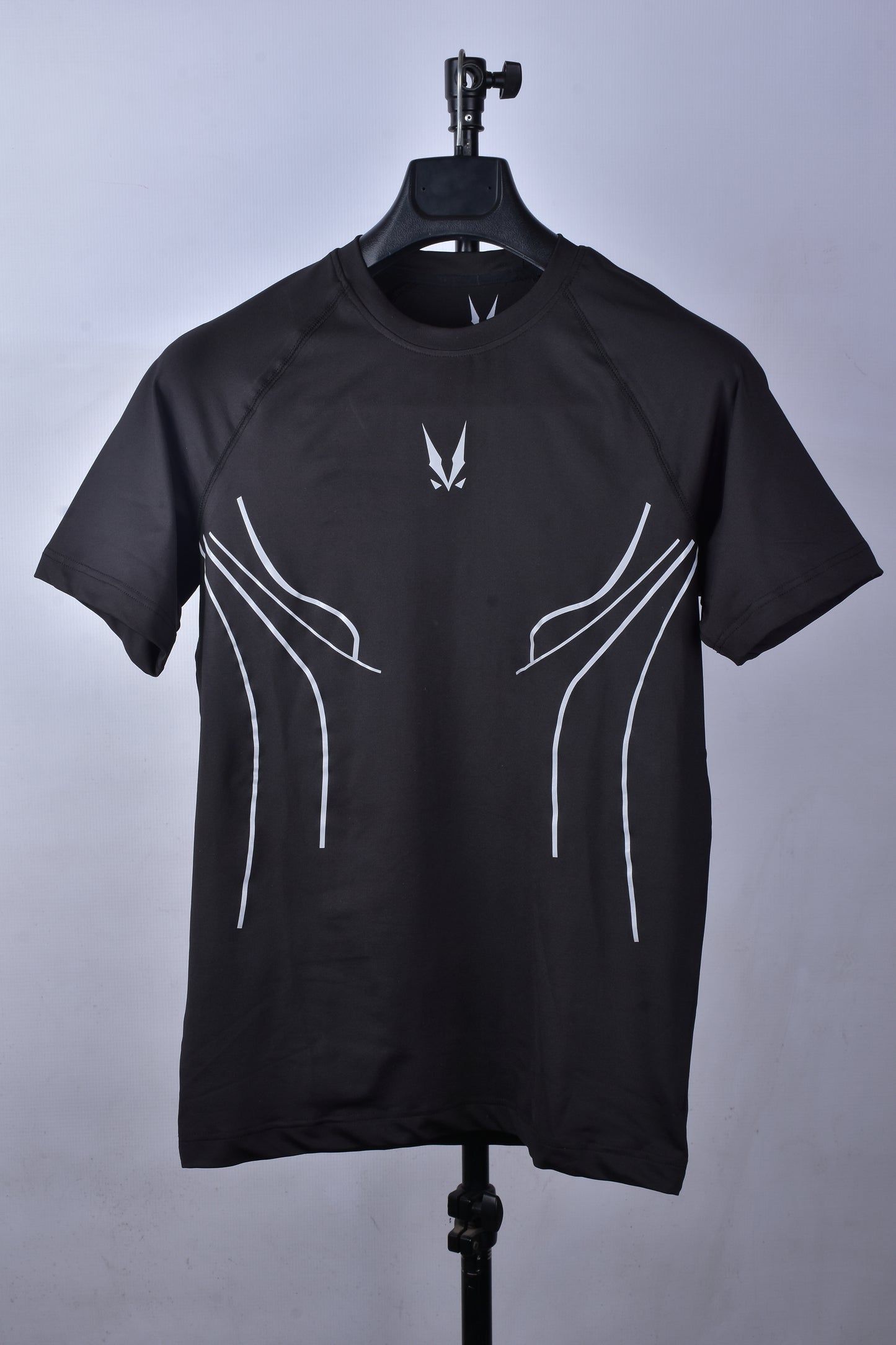 RAVIX Black compression t-shirt with white beam designs on a gray background