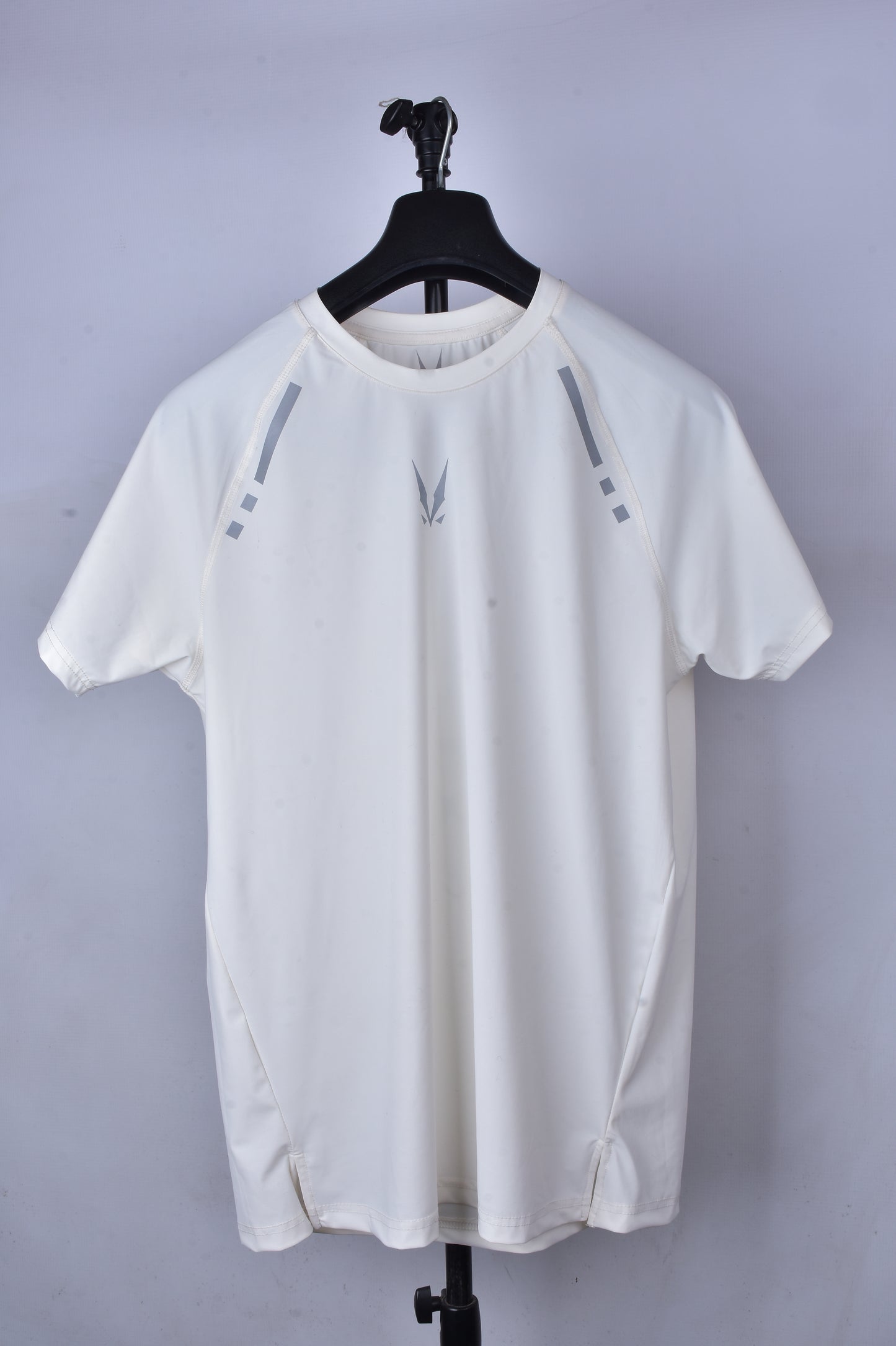 RAVIX white regular t-shirt with black accents on a hanger against a plain background