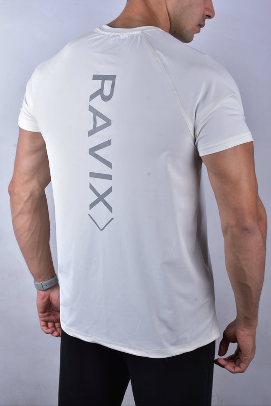 Person wearing a white t-shirt with 'RAVIX' logo on the back against a plain background